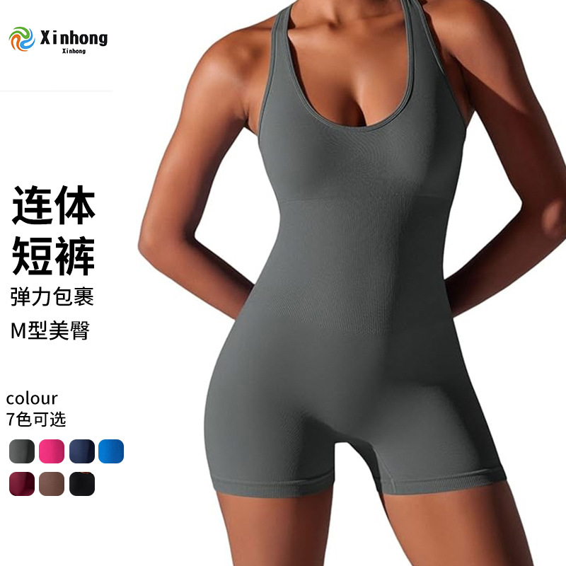 Nueva ropa de yoga europea y americana, mono de una pieza de color sólido ajustado, hermosa espalda aérea, mono de yoga transpirable sin costuras