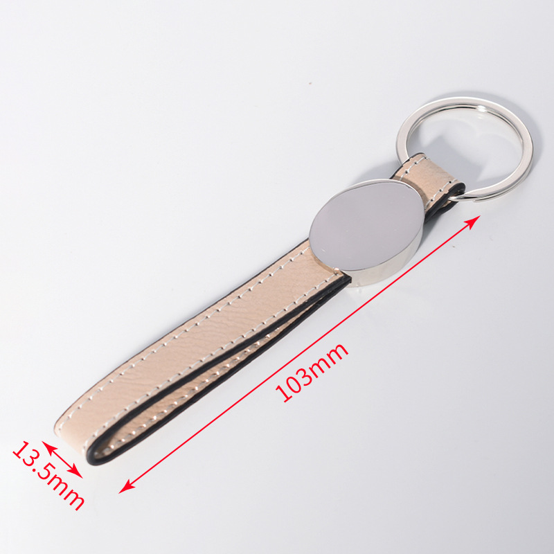 Transfronterizos en blanco spot embrión láser de cuero llavero de metal cuero colgante de automóvil personalizado regalos de negocios de alta calidad