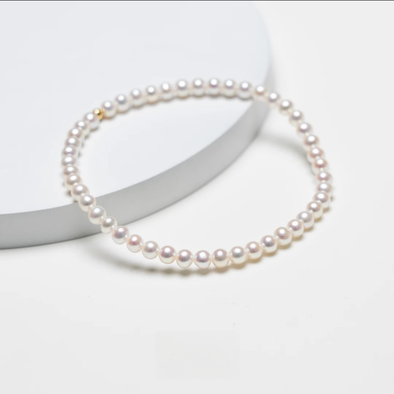 High-Quality Baby Zhuji Pearl Bracelet 4-5mm Perfectly Round, Almost Flawless, Aurora 18K Gold Ball