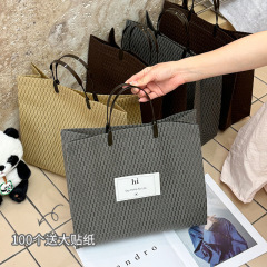 シンプルで厚い不織布袋手提げ袋高級洋服店大容量包装袋レジ袋ギフト袋