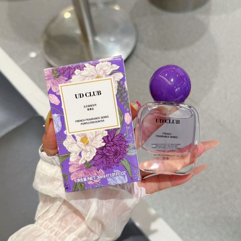 UD CLUB polvo encuentro púrpura encuentro perfumes femeninos encantadores flores y frutas fragancias ligeras duraderas fabricantes Qixi