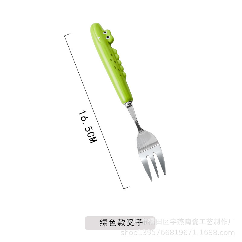 작은 녹색 악어 포크