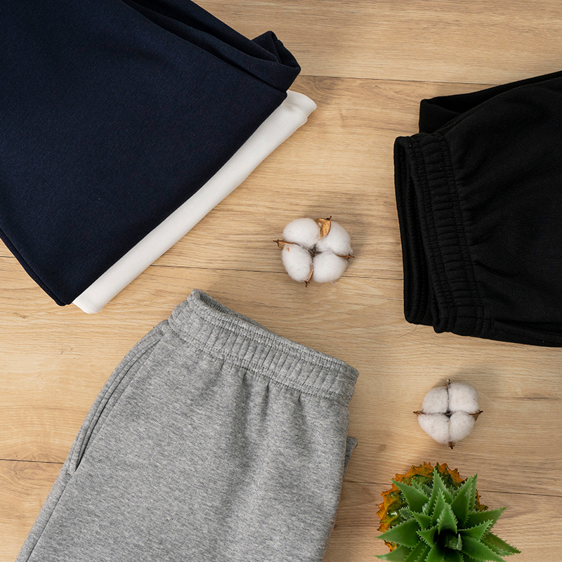 De gama alta de 430g de lana forrada engrosada Pantalones deportivos de otoño e invierno de los hombres Nuevos pantalones sueltos de algodón atado al tobillo pantalones casuales de chándal de las mujeres