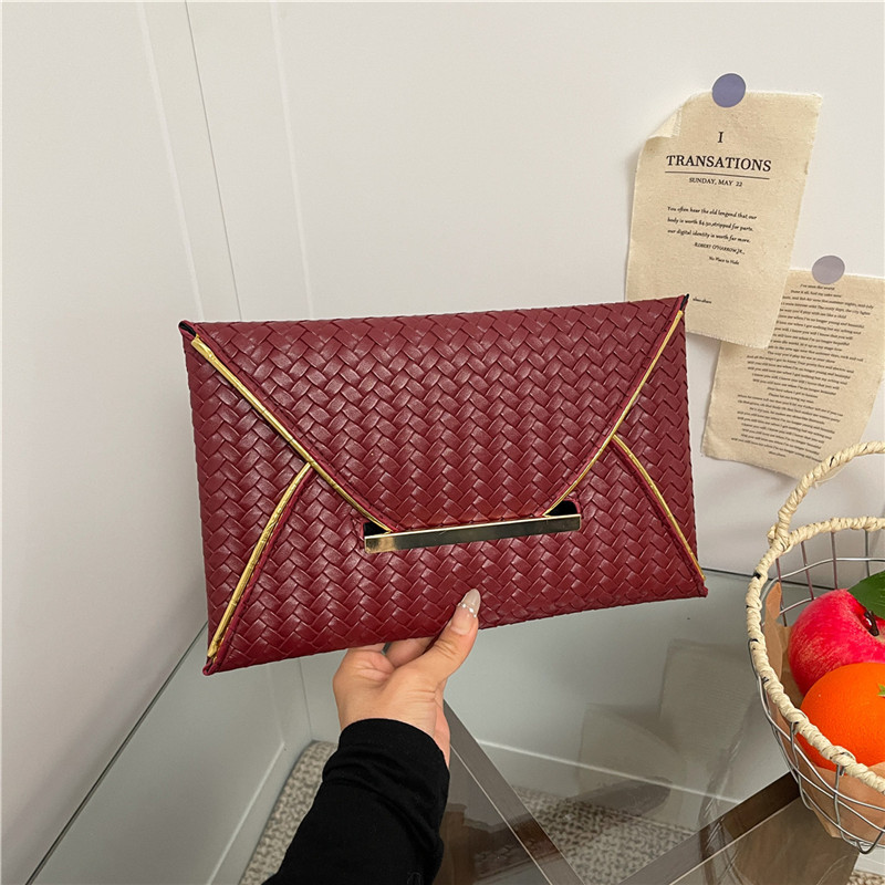 Simple color sólido popular de alto rendimiento sobre de sensación de mujer cena temperamento ligero lujoso moda bolsa de mano casual
