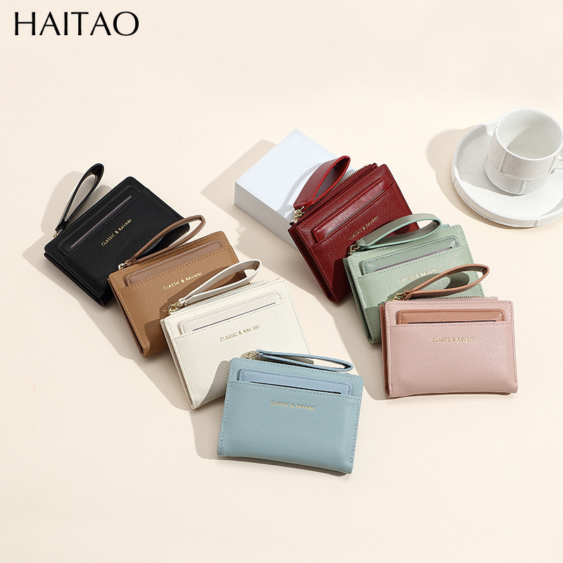 Nueva billetera de mujer corta bolsa de tarjetas de color sólido2024 mujeres de alto nivel sentido transfronterizo cremallera fuente de bolso de cambio fabricantes