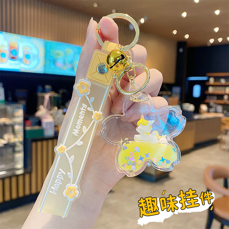 Púrpura estrella de cinco puntas líquido Quicksand llavero chica corazón flor de cerezo aceite colgante lindo tridimensional mochila adornos para mujeres