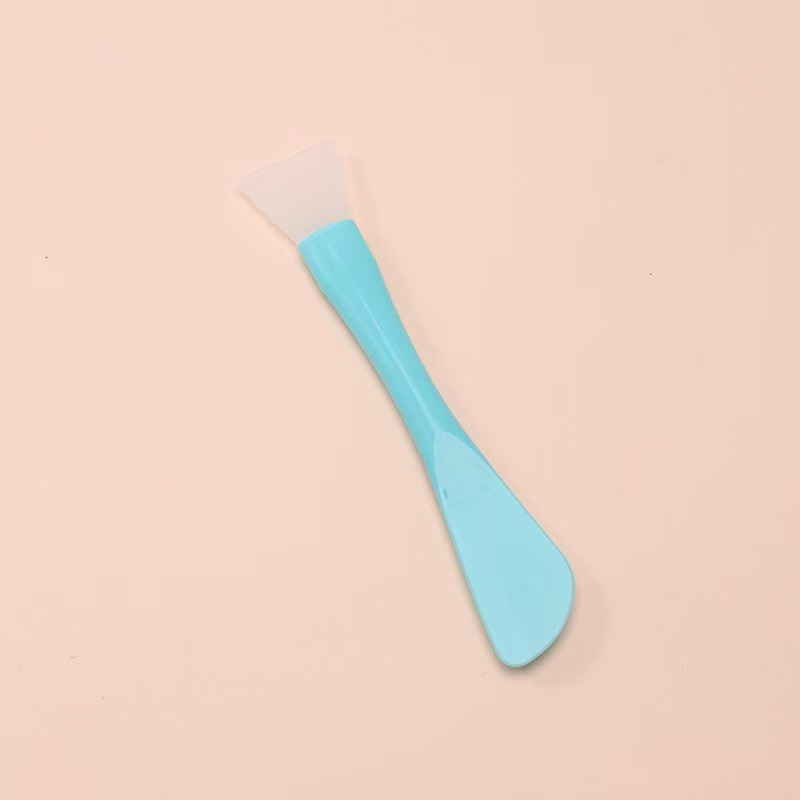 Blue mask brush with scraper