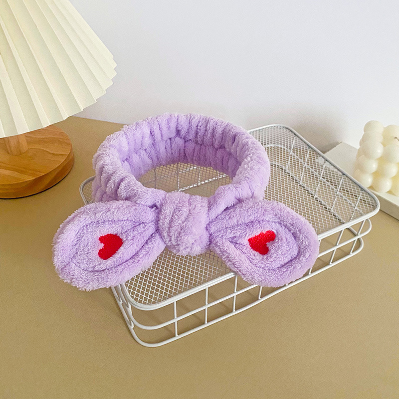 Celebridad en línea estilo coreano bordado pequeño corazón arco banda para el cabello deportes de las mujeres yoga pañuelo cara lavado banda para el cabello accesorios para el cabello al por mayor