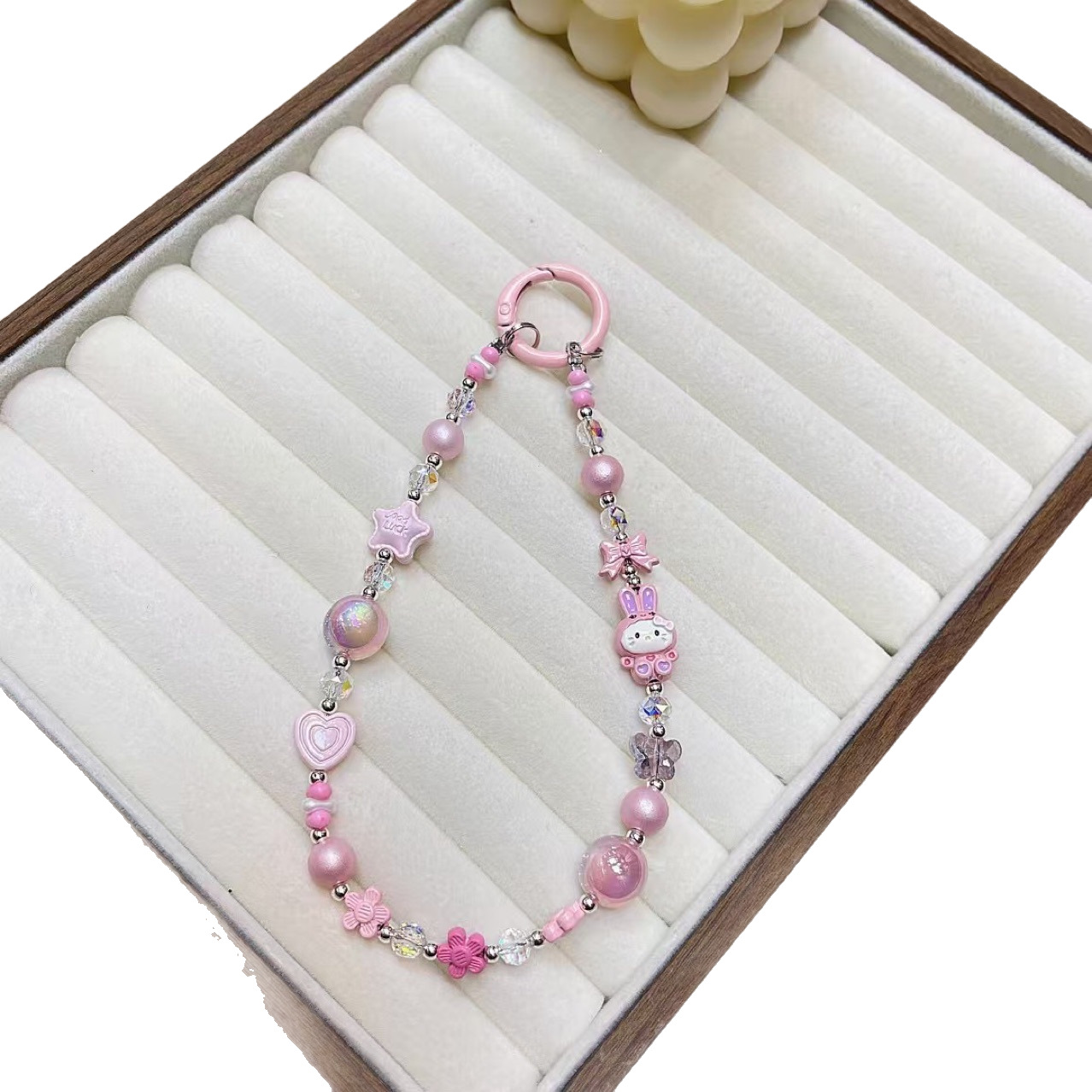 Creativo de dibujos animados KT conejo aleación cadena teléfono móvil cordón muñeca nuevo DIY hecho a mano cuentas estrella de cristal colgante de equipaje