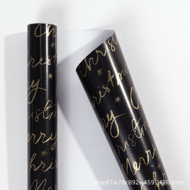 Rollo de papel de regalo de Navidad transfronterizo paquete de tubo de papel de regalo de árbol de Navidad de copo de nieve de oro negro rollo de gran tamaño sentido avanzado