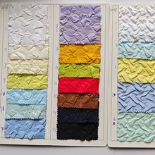 2024新品3D立体压花肌理布料外套服饰饰品面料复合压皱起泡面料