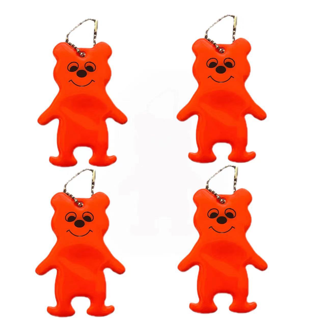 Fabricantes de procesamiento de colgantes reflectantes modelado oso colgantes reflectantes PVC llavero colgante