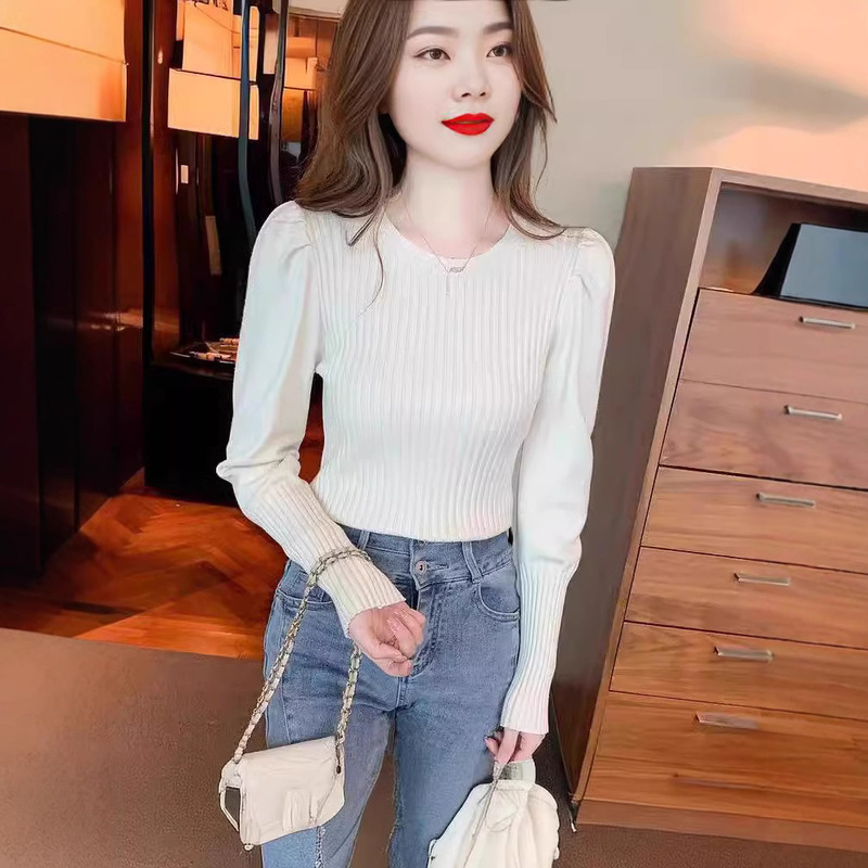 芯の糸を巻いて泡の袖の底のシャツの女性の秋冬の服の新型のファッション的な洋風の中でニットのセーターの上着を掛けます。|undefined