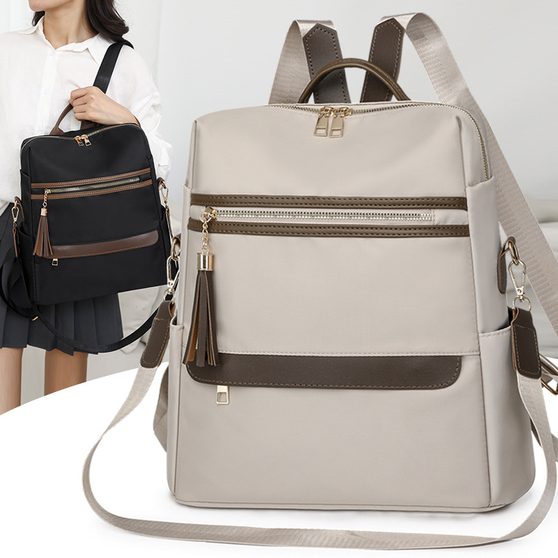 2024 verano nuevo estilo señoras mochila de nailon moda borla gran capacidad contraste color viaje mochila de un solo hombro al por mayor