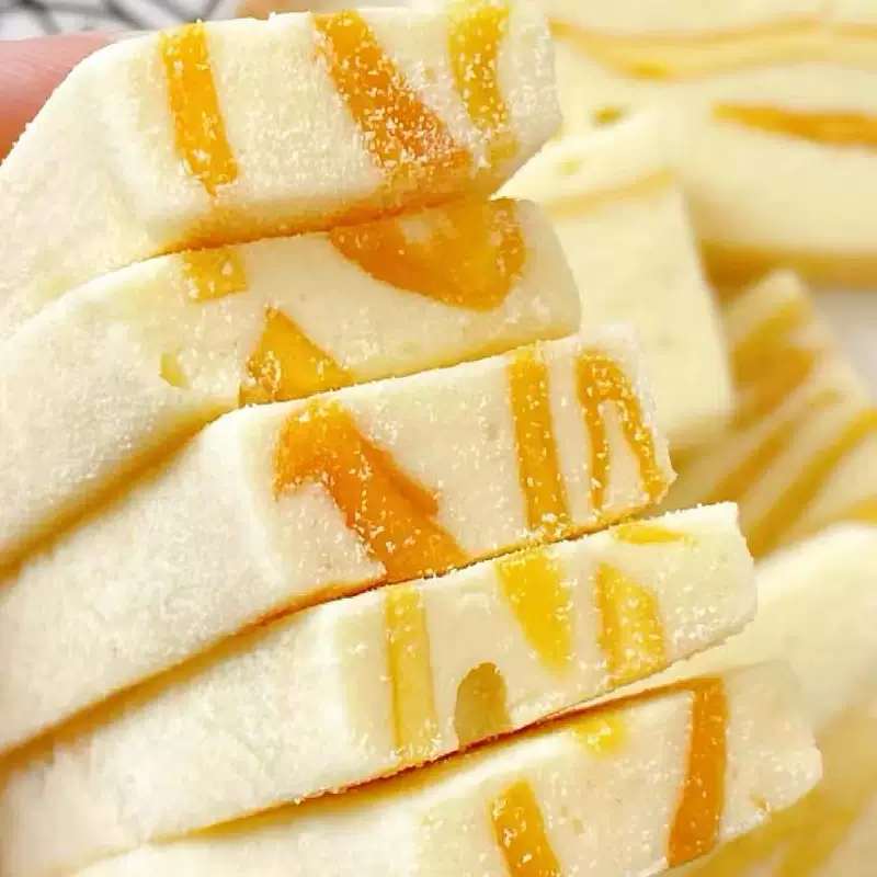 Ll Mango milk crisps Xinjiang specialty snacks and snacks Mango milk cake soft and glutinous snack food independent bag