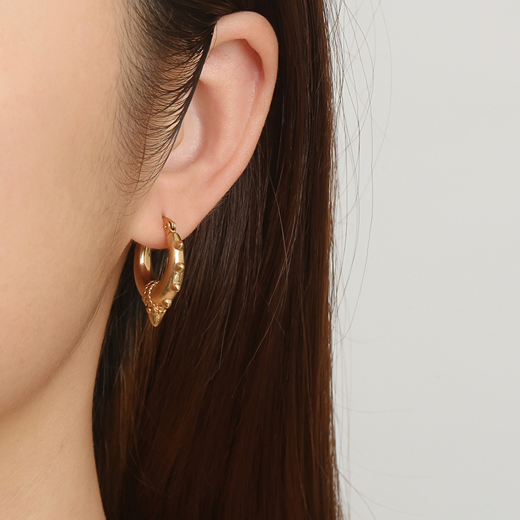 Boucles d'oreilles en acier inoxydable en forme de cône pointu rond de mode européenne et américaine transfrontalière pour femmes, boucles d'oreilles tendance plaquées or en gros_voghion.com