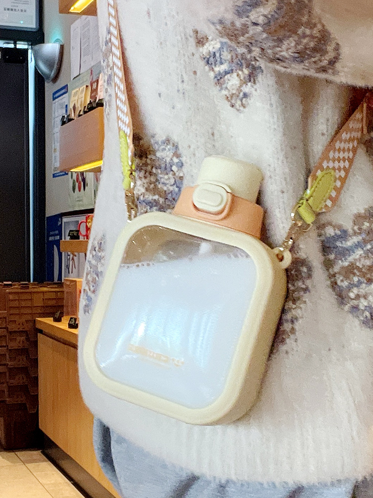 Instagram-worthy, high-fashion water bottle with a straw—perfect for girls on the go! Stylish, portable, and kids'/students' friendly—plus it’s shatter-resistant and comes with a convenient crossbody strap.