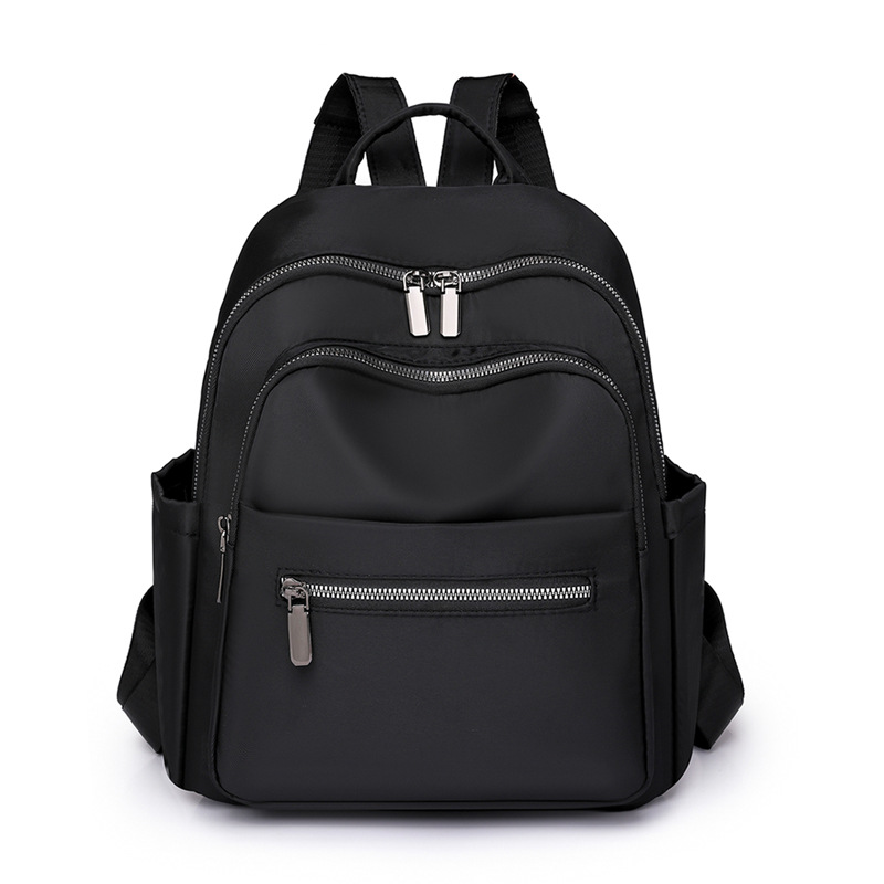 Transfronterizo al por mayor 2023 nueva mochila de nailon para mujer coreana simple y versátil mochila de viaje anti-salpicaduras de agua mochila escolar