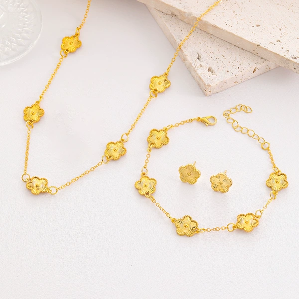 Golden necklace, bracelet, earrings