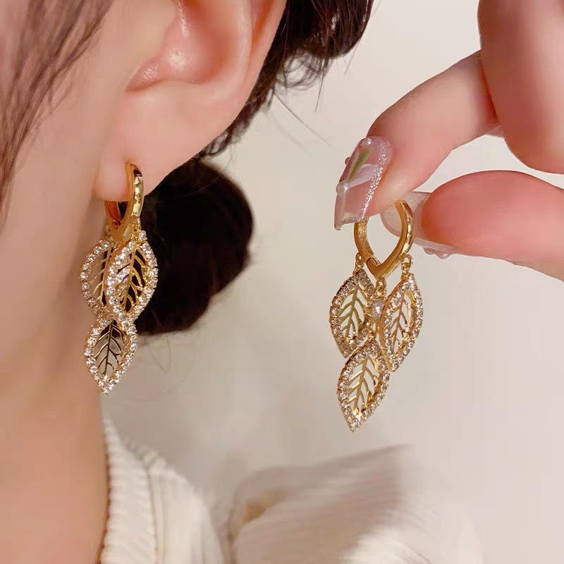 Sophisticated small design fashionable earrings with zircon with…