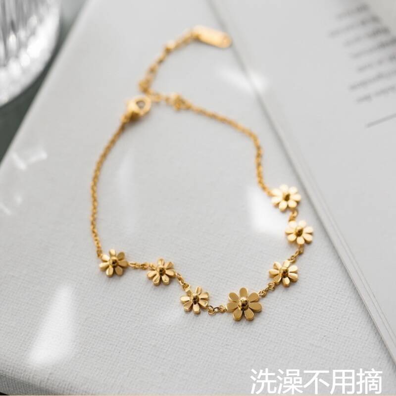 2022 nuevo oro pequeño Zou Ju tobillera ajustable japonés y coreano hembra titanio acero nicho siete flor tobillera hembra