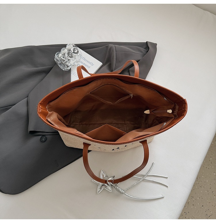 Summer striped woven large-capacity tote bag 2025 New style fashionable and trendy Korean style simple and elegant casual single-shoulder bag undefined