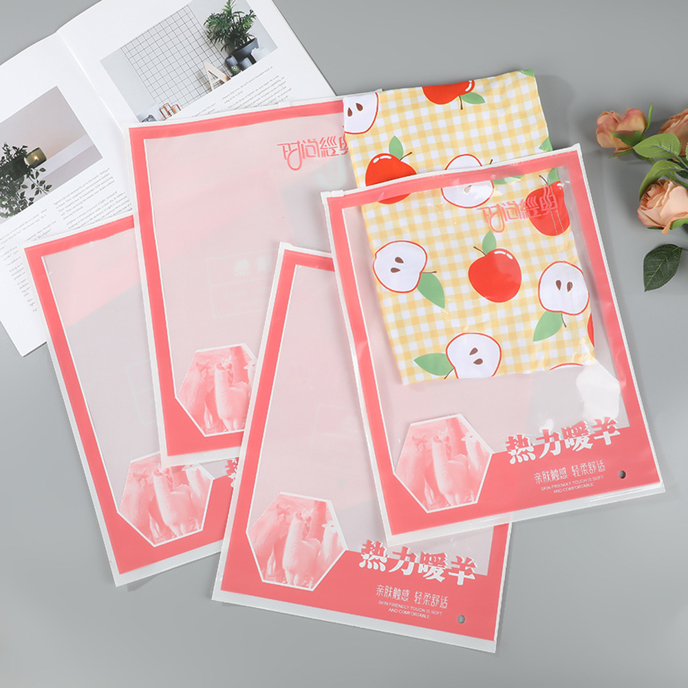 Bolsa con cremallera de ropa Bolsa con cremallera de crisantemo pequeño Bolsa de embalaje de camiseta Bolsa de ropa interior Bolsa de ropa PE esmerilada pequeña bolsa ziplock