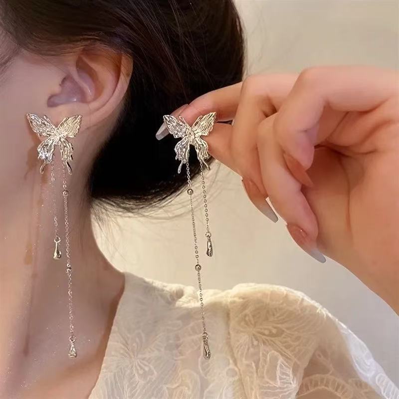 Liquid butterfly tassel earrings