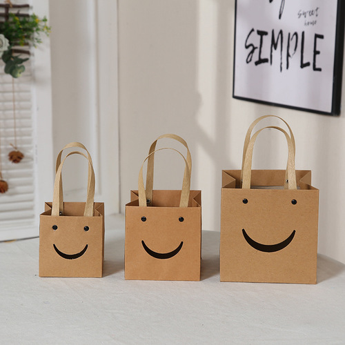 Simple gift bag with smiley face baking packaging bag cake square bottom hand bag kraft paper hand gift bag