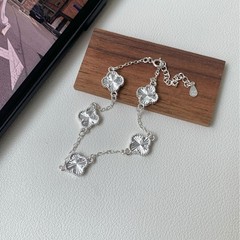 S925 スターリングシルバーレーザー四つ葉のクローバーブレスレット女性のためのライト高級ニッチシンプルな多用途ハンドジュエリー誕生日ギフトドロップシッピング
