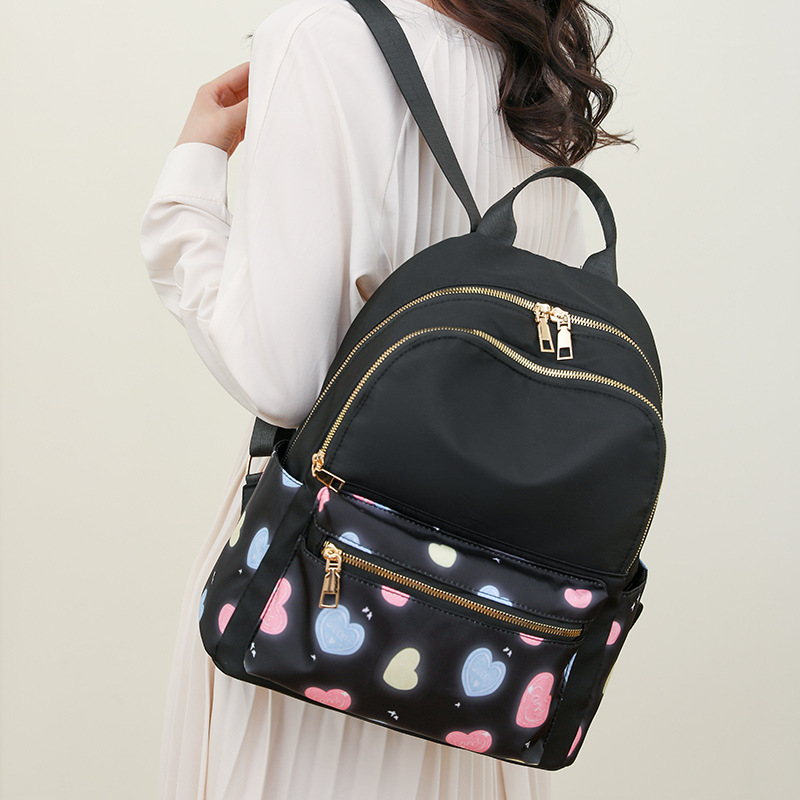 Mochila de moda de las mujeres al aire libre bolsa de viaje casual estudiante mochila ligera bolsa de tela de nylon impermeable