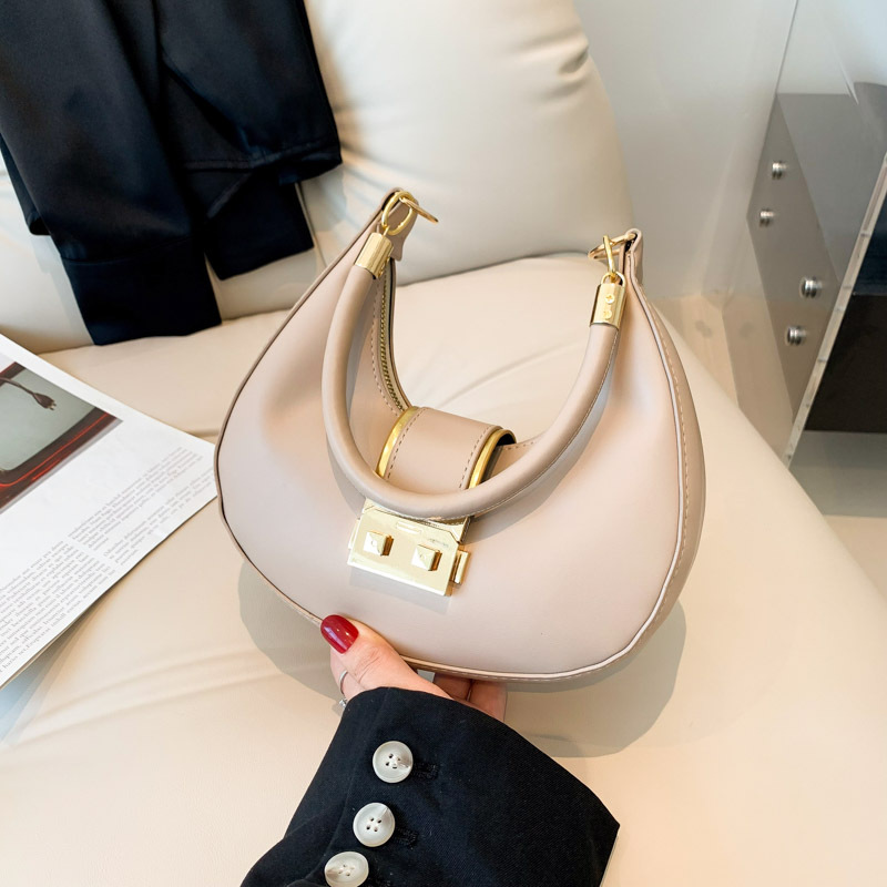 Bolso de hombro de cercanías simple bolso de las axilas retro de las mujeres 2023 nicho de otoño nuevo bolso de mensajero del color del caramelo bolsas