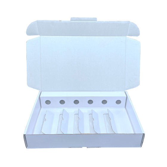 Horizontal row of six bottles of wine flying machine box red wine flying machine box double red wine box