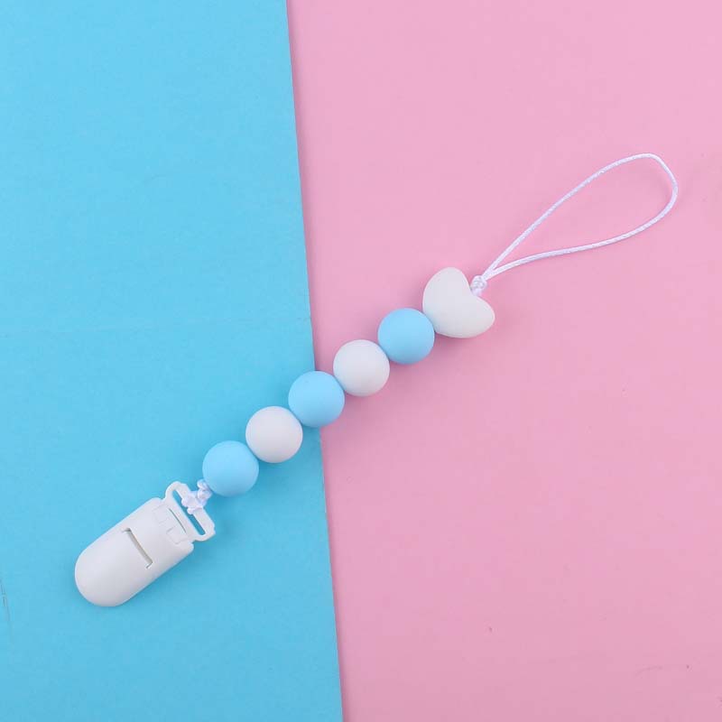 Nuevo bebé suministros de dibujos animados amor silicona DIY creativo macaron color serie mordedura cola molar pezón