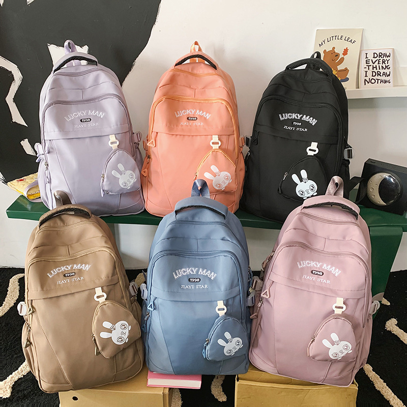 Mochila japonesa de alto valor JIAYISTAR nueva mochila de ocio para estudiantes de secundaria.