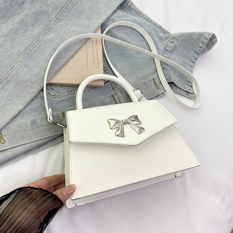 Arco de moda de verano 2025 hermoso nuevo estilo ocio de estilo extranjero suave portátil de hombro mochila pequeña bolsa de mujer