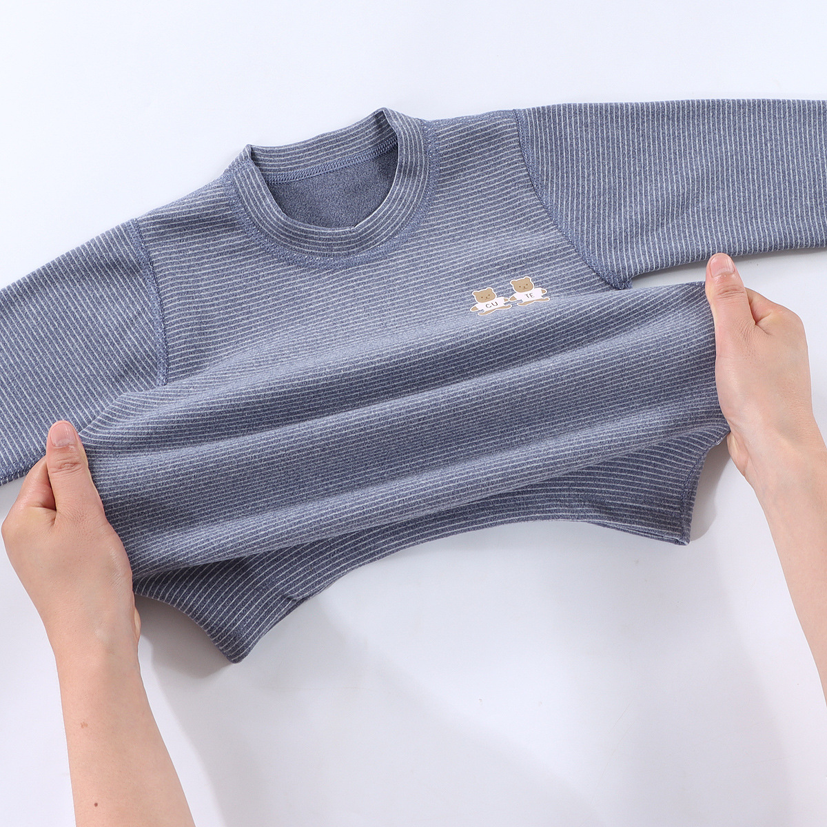 Niños sin hueso de ternero de cuello alto nuevo abrigo de otoño conjunto de pantalones de oro para hombres y mujeres estriado conjunto de ropa interior cálida