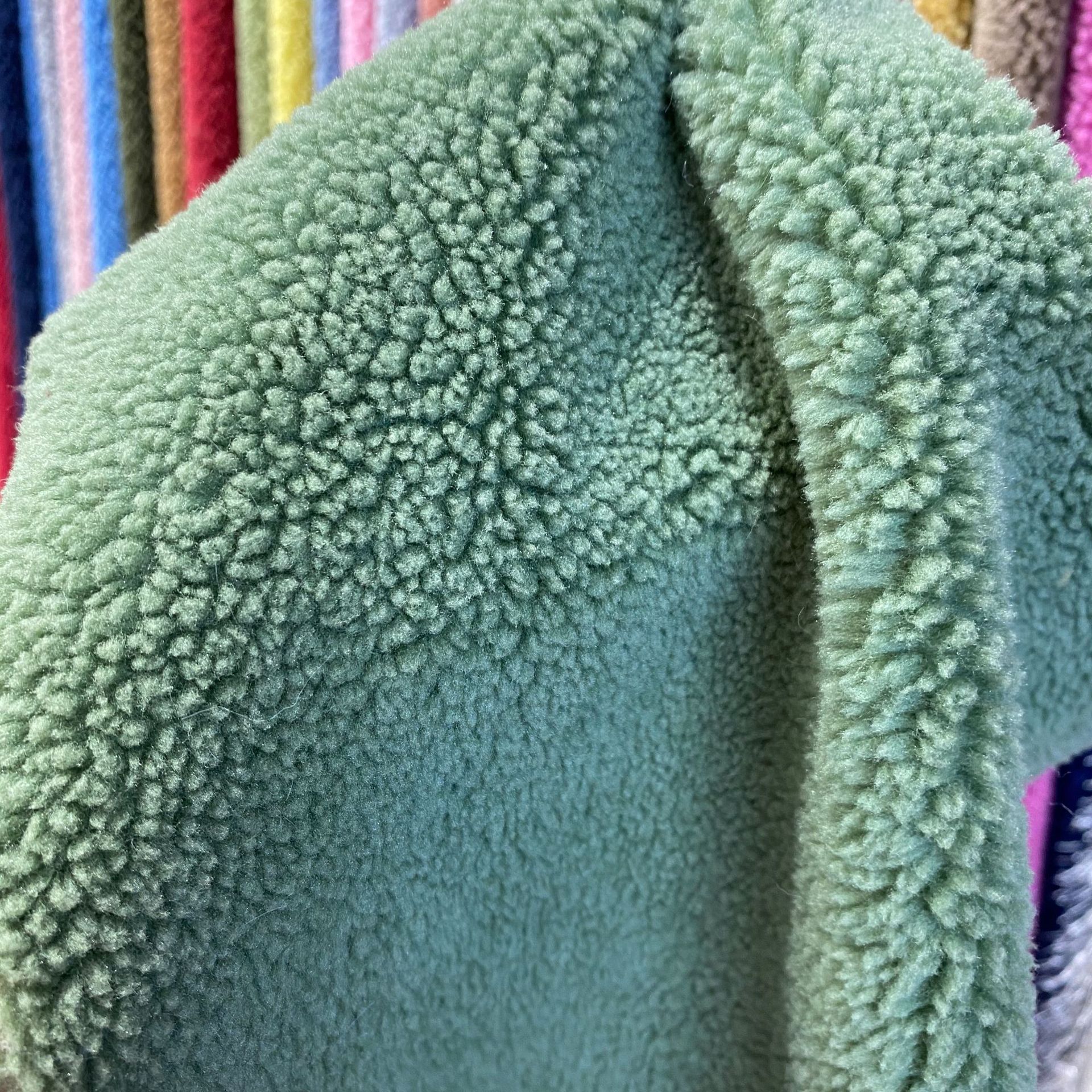 Fabricantes de granos pequeños granos de cachemira de cordero agudo granos de cachemira ropa de juguetes tela de bolsa