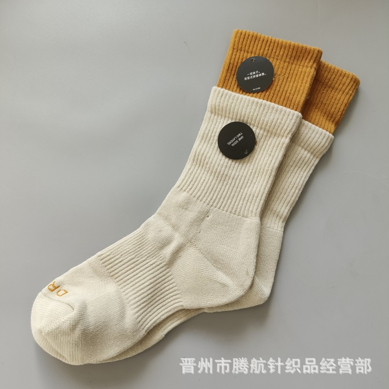 蘇万ナイキの靴下のカラーの二重は男女の中で長い筒のタオルの底のスポーツの靴下をつなぎ合わせてバスケットボールの靴下を走ります。