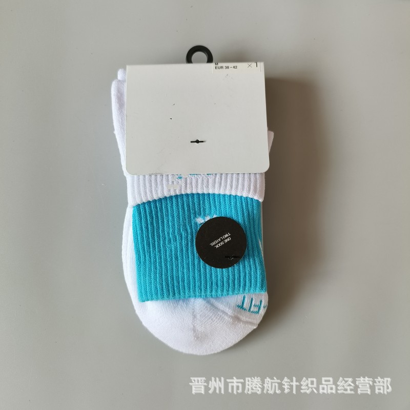 蘇万ナイキの靴下のカラーの二重は男女の中で長い筒のタオルの底のスポーツの靴下をつなぎ合わせてバスケットボールの靴下を走ります。