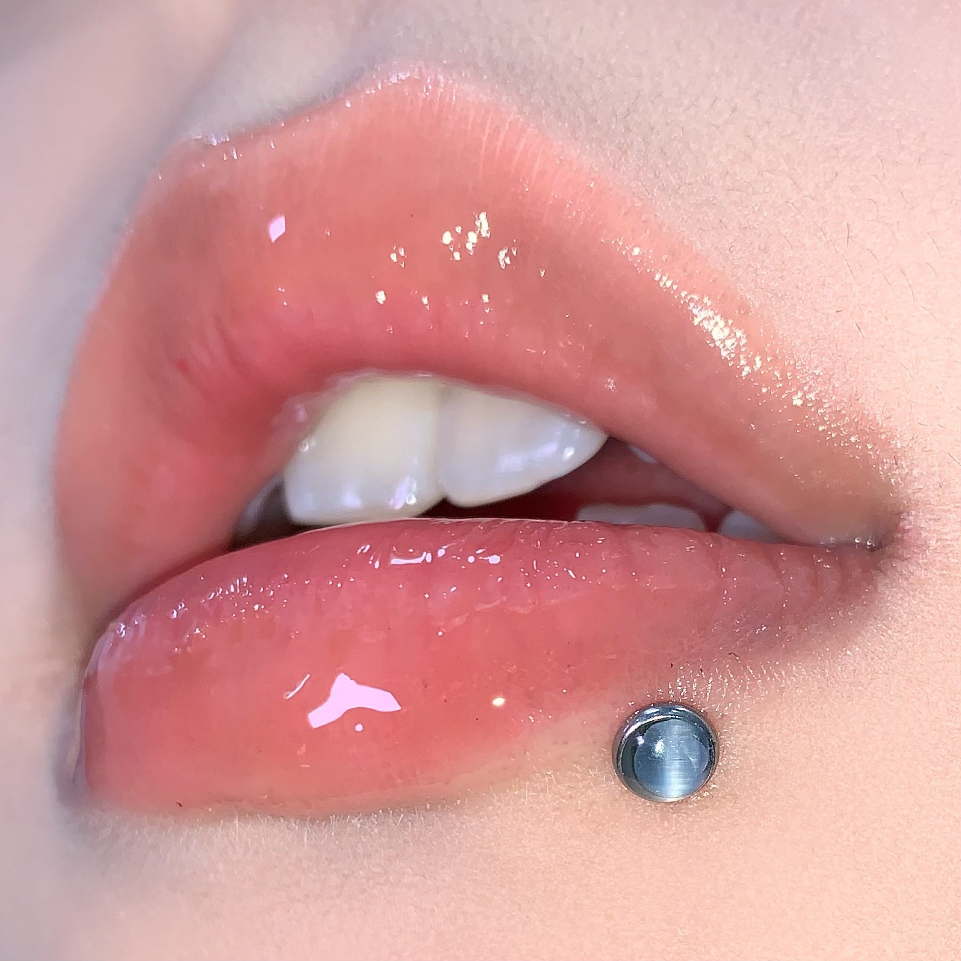 Silver pointed spike labret stud material detail