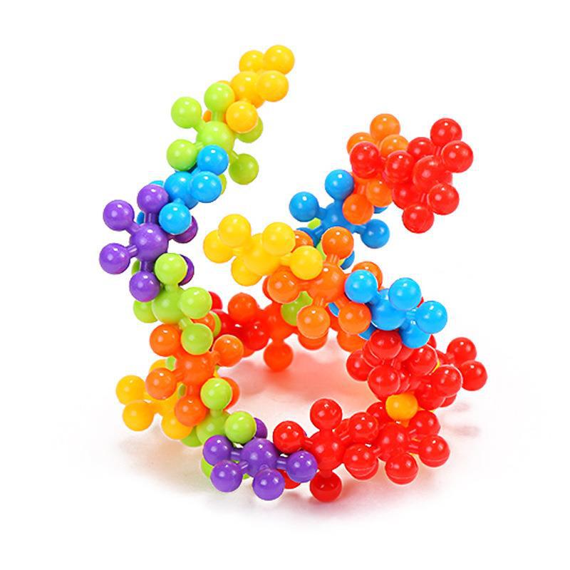 Transfronterizo Amazon 3D giratorio tridimensional copo de nieve Plum Blossom bloques de construcción de empalme de plástico juguetes para niños