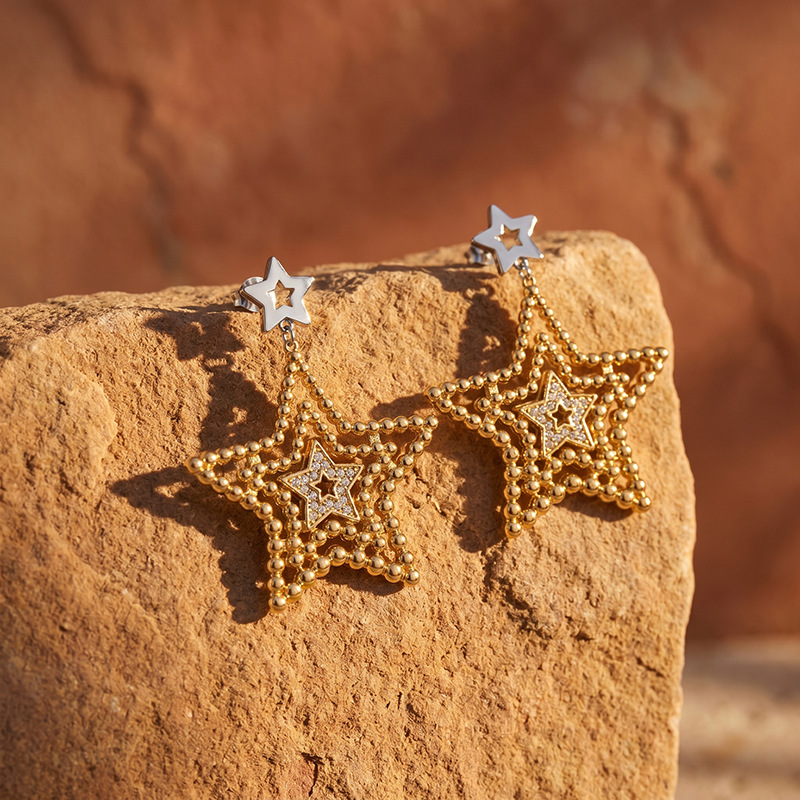 TENA Europa y los Estados Unidos acero inoxidable transfronterizo esfera dorada estrella de diseño de estilo pentagrama temperamento aretes de aretes versátiles
