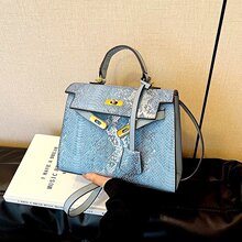 时尚女包2025年新款手提通勤包轻奢质感蛇纹包大容量翻盖包包