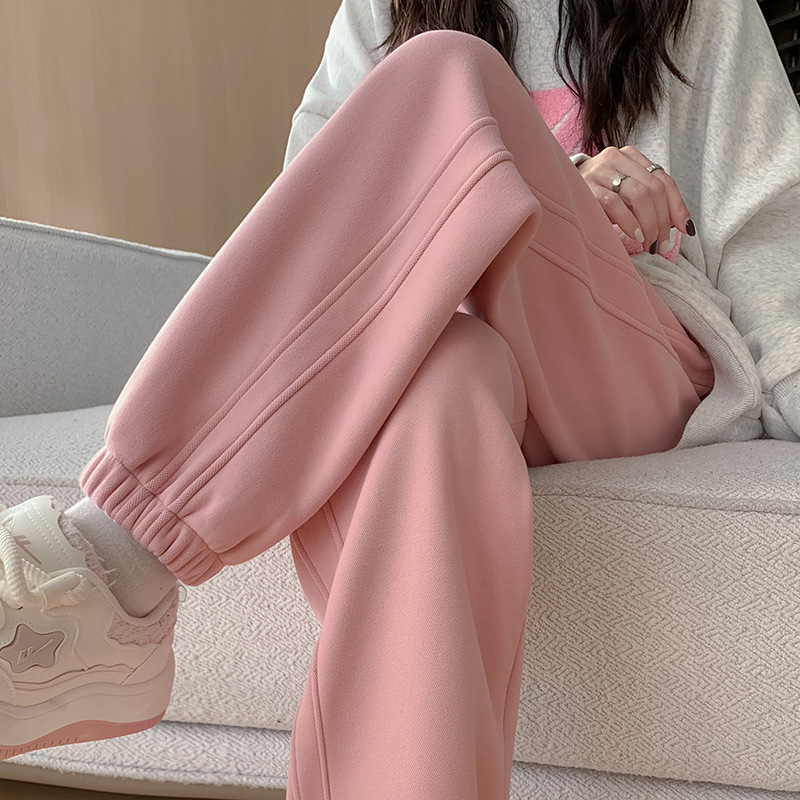 ピンクの裏起毛スウェットパンツ レディース フリースパンツ 秋冬 2025年新作 アウター用 綿パンツ フリース素材 フリース裾デザイン