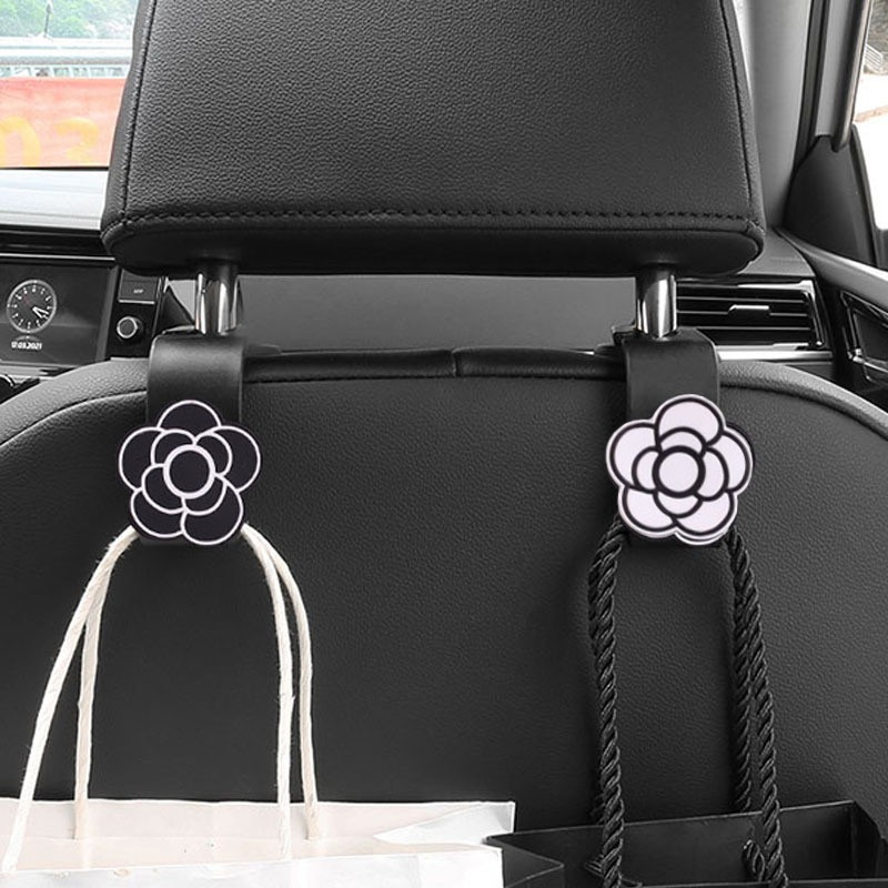 Meiyesi suministros de decoración de automóviles silla trasera gancho de coche celebridad de Internet hermoso gancho de dibujos animados almacenamiento de camelia