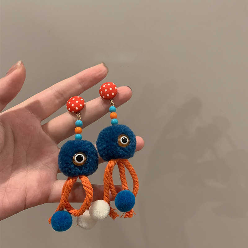 The unique wool ball earrings are suitable