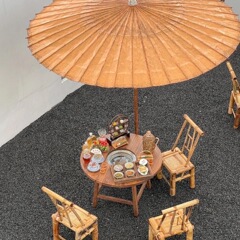 炉で紅茶を淹れる屋外傘、古代風の大きな油紙傘、中国風の中庭の雨よけと日よけ傘
