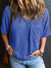 A womens solid color pocket shortsleeved Vneck Tshirt top