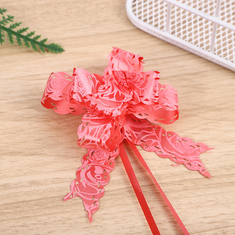 Comercio exterior Venta caliente 18 impreso encaje arco mano-Tirado flor Navidad vacaciones regalo embalaje tirar flor multicolor multi-patrón